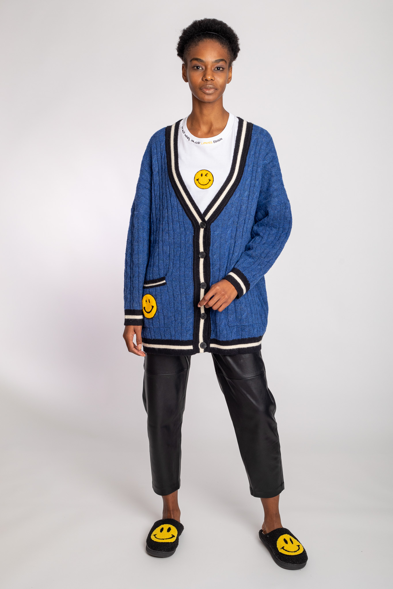 smiley face blue cardigan