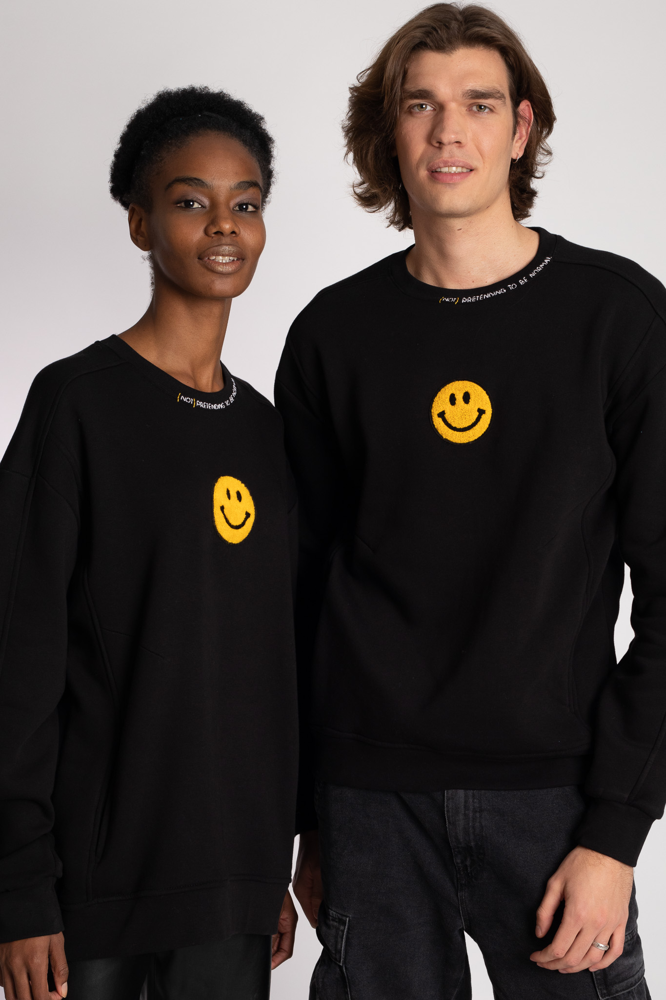 smiley face embroidered black sweatshirt unisex