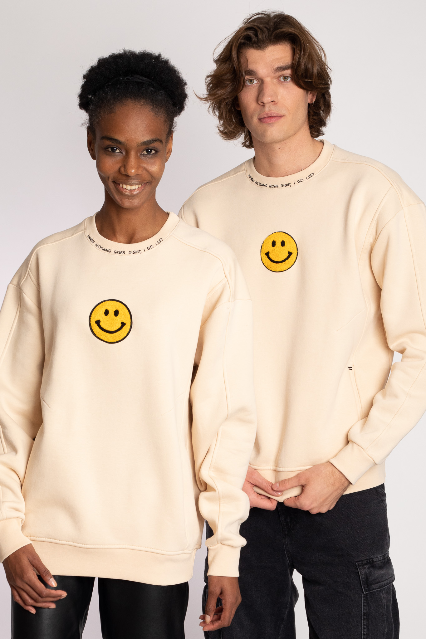 smiley face embroidered beige sweatshirt unisex
