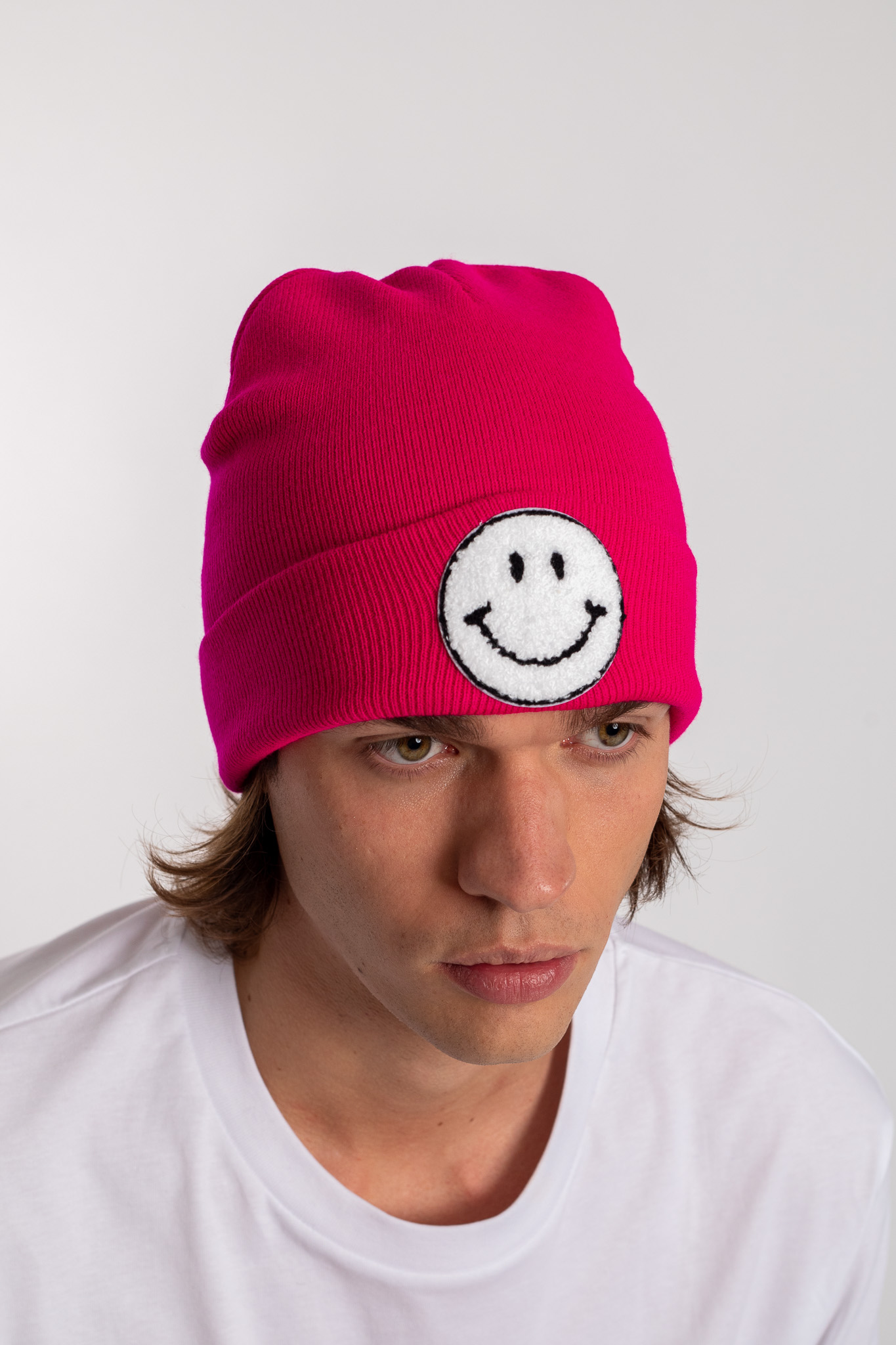 white smiley fuchsia beanie